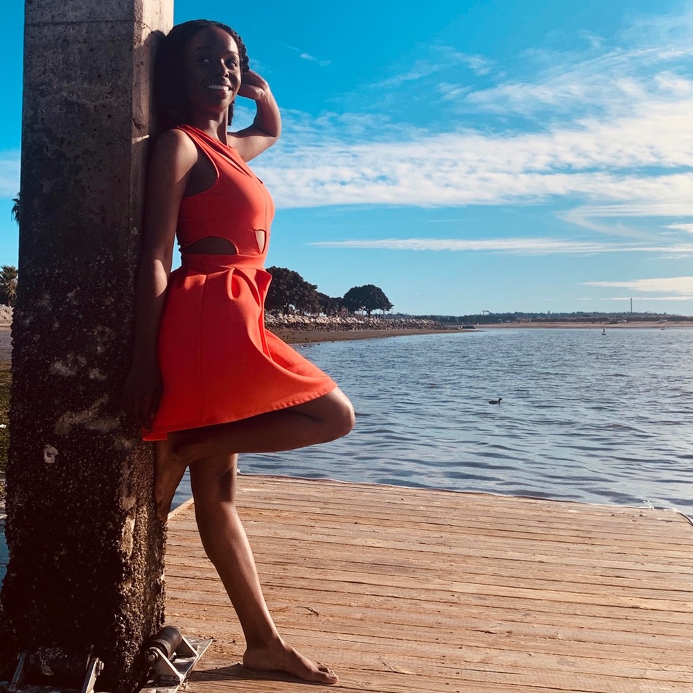 Bright orange cut out dress